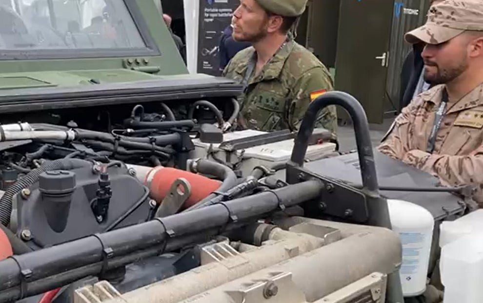 Soldiers inspecting 3D Printed parts
